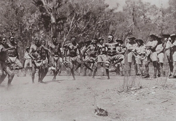 Natives dance to an audience of Aussies (b  /  w photo)