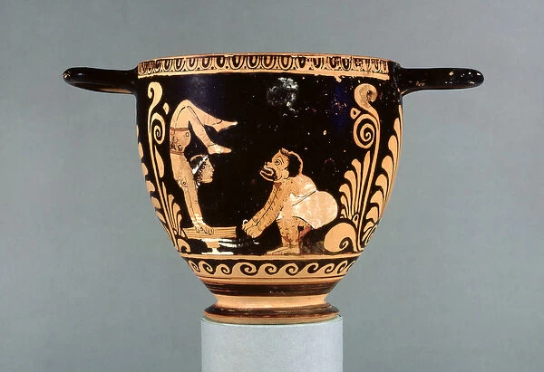 Paestan red-figure skyphos, decorated with a phlyax actor and a female acrobat, Greek