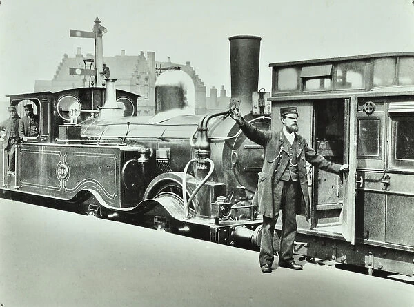 Platform Porter at a railway station, 1885 (b  /  w photo)