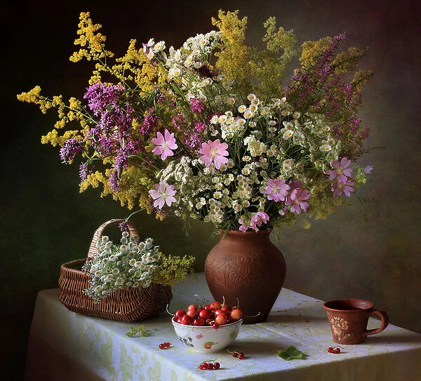 With a bouquet of meadow flowers and berries