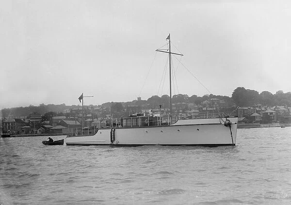 The 12 ton motor yacht Cordon Rouge at anchor, 1923. Creator: Kirk & Sons of Cowes