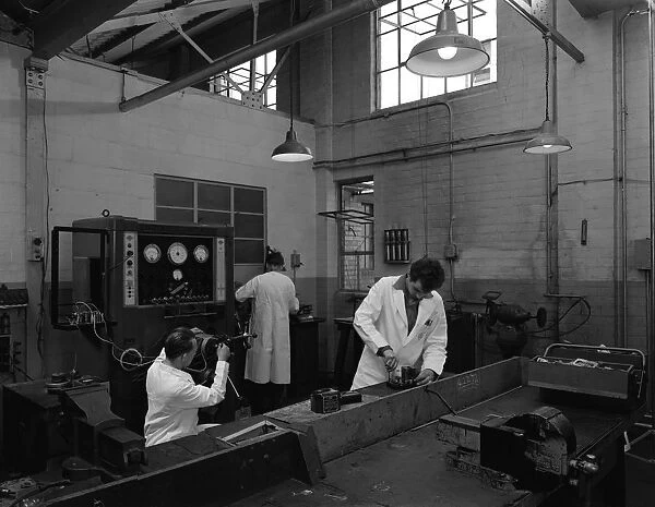 Auto electricians at work at Globe & Simpson, Nottingham, Nottinghamshire, 1961