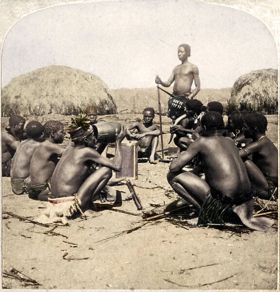 Braves of a Zulu Village holding a Council, near the Umlaloose River, Zululand, S. A. 1901