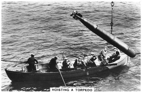 Hoisting a torpedo, HMS Courageous, 1937