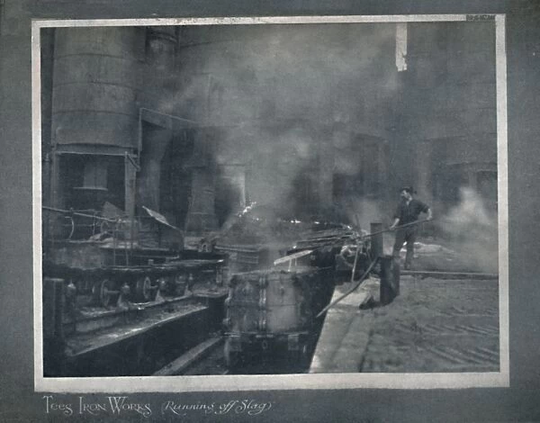 Tees Iron Works - Running Off Slag, 1919. Artist: Hood & Co. Ltd