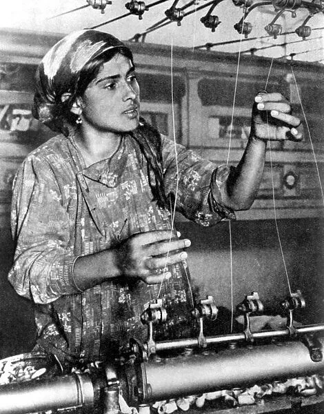 Woman working in the silk industry, Samarkand, Uzbekistan, 1936