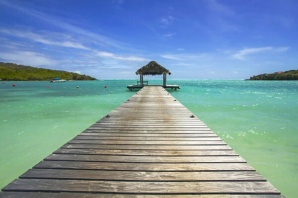 A jetty at a tropical beach resort in the Caribbean