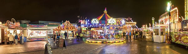 Rides Illuminated In An Amusement Park At Nighttime; Sunderland, Tyne And Wear, England