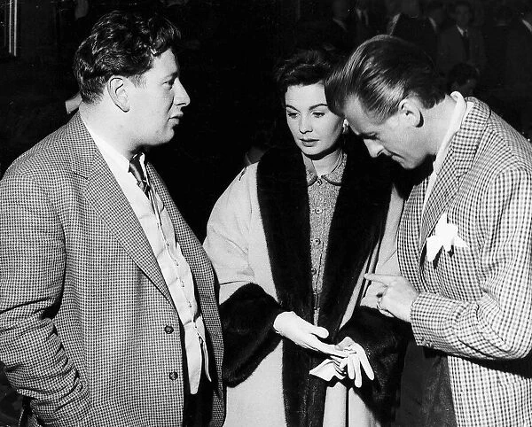 Actor Peter Ustinov with actress Jean Simmons and actor Stewart Granger at the Royal