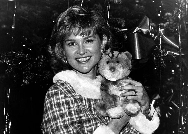 Anthea Turner TV Presenter with a Cuddly Toy