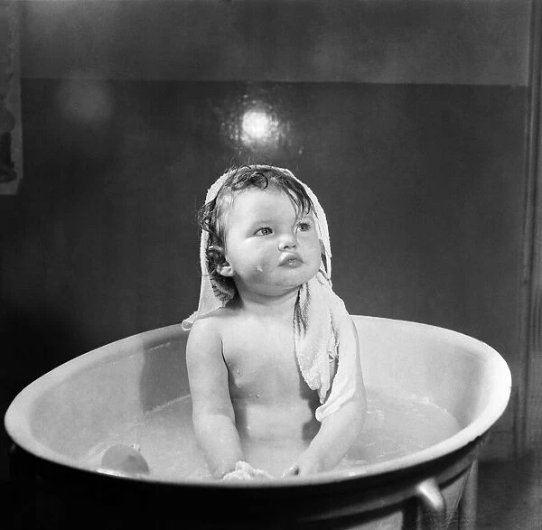 Bath time for one year old Kathleen Skelly is the happiest moments for her at