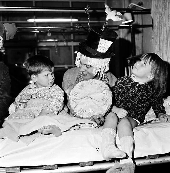 Children of Booth Hall Hospital meet character from Alice in Wonderland: Donna George, 5