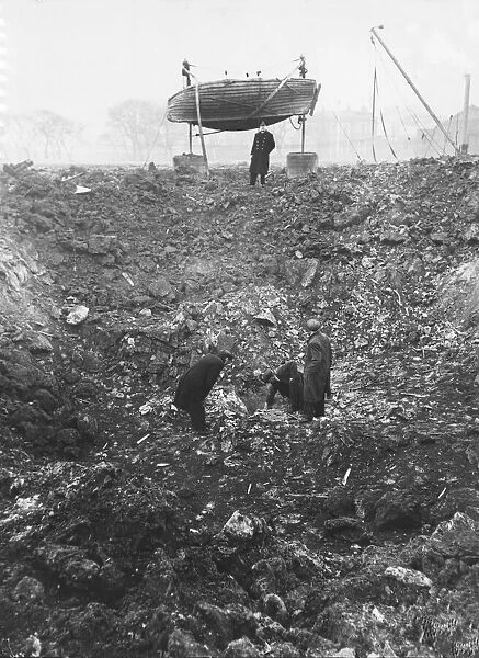 A crater made by a German bomb in an air raid on a school in Wallasey, Merseyside