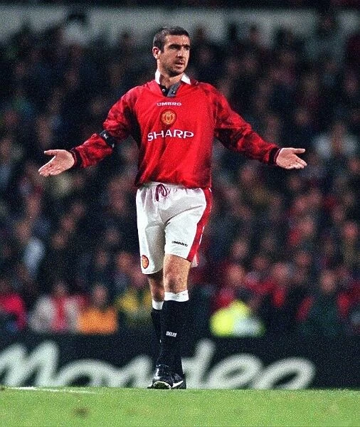 Eric Cantona Manchester United player gestures during the Champions League game at Old