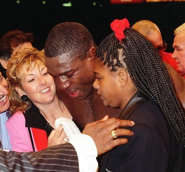 Frank Bruno WBC Heavyweight Champion is congratulated by his wife Laura after beating