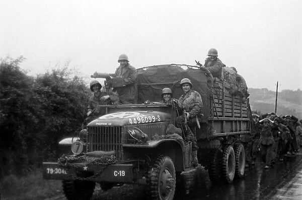 German Soldiers captured in Cherbourg are escorted to camp by allied forces June 30th