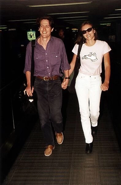 Hugh Grant Actor walking hand in hand with girlfriend Elizabeth Hurley