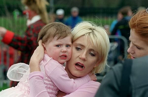 Michelle Collins Actress April 98 Eastenders actress with her daughter Maia taking
