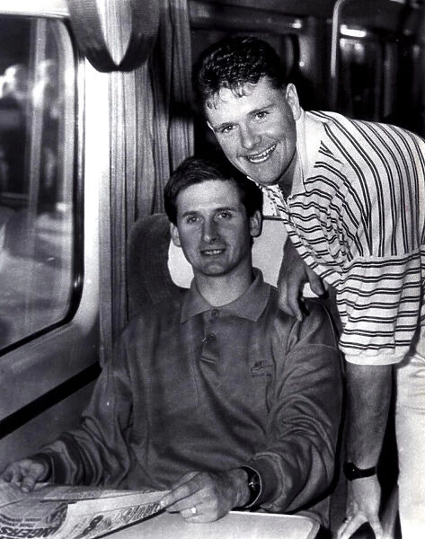 Newcastle United players Glenn Roeder with team mate Paul Gascoigne pictured on a train