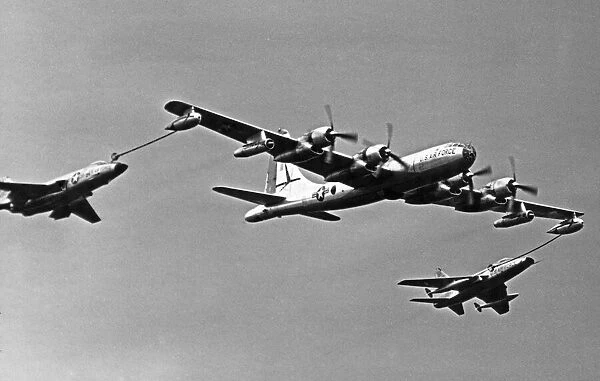 A United States Air Force KB50 tanker refuelling F100 and F101 fighter planes during a