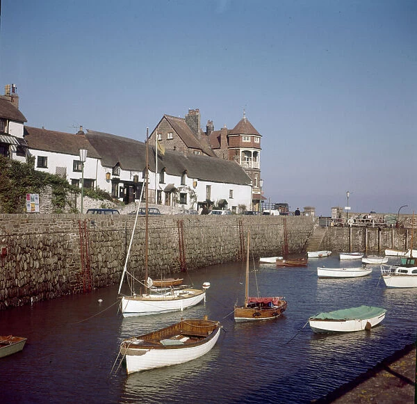 View of the town of Lynmouth on the North Devon coast, showing boats moored in