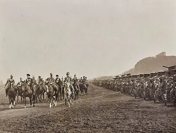 King Vittorio Emanuele III of Savoy (1869-1947) on horseback looks at the army