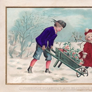 Boy and girl in snow on a fabric Christmas card