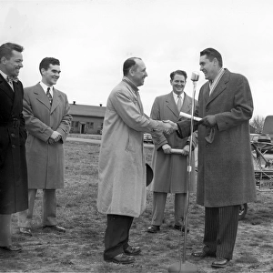 Charles H Kaman receiving the first Ca certificate