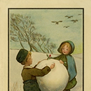 Two children with a large snowball