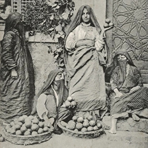 Egyptian Orange Sellers posing