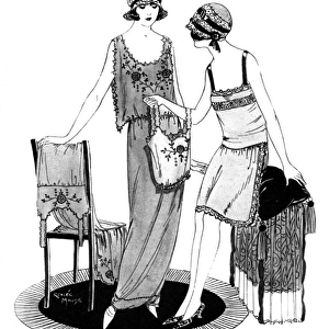 Fashionable ladies discussing a set of undergarments