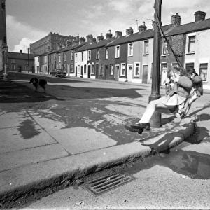 Girls playing in Milton Street, Belfast, Northern Ireland