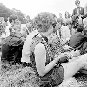 Hippies relaxing in a field at Woburn Park