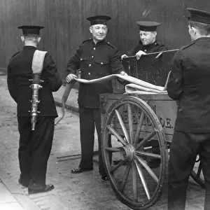 LCC-LFB firefighters with old hose cart