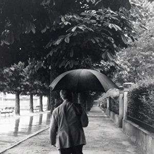 Man in plus fours in the rain, Lucerne, Switzerland