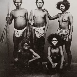 Native tribal group with weapons, probably Philippines