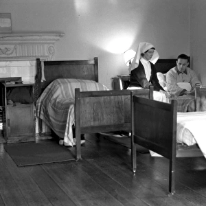 Nurse and patient in a Red Cross convalescent home