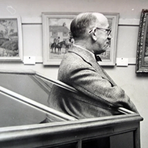 Photo of William Harold Hutchings at art exhibition