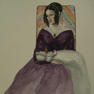 Portrait of a woman with a baby on her lap