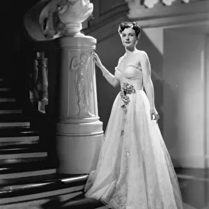 Ruth Hussey wearing a strapless evening gown - Dolly Tree
