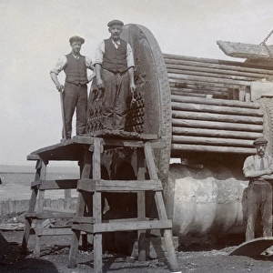 Ship breakers of T W Ward Ltd, with old boiler
