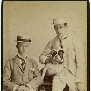Studio portrait, two young men with bulldog