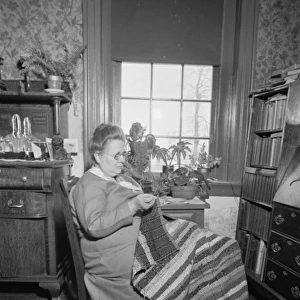 Westmoreland homesteader wearing dress of cloth woven hersel