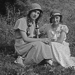 Two young women in a field