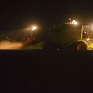 Combine Harvester - reaping corn at night - Lower Saxony - Germany