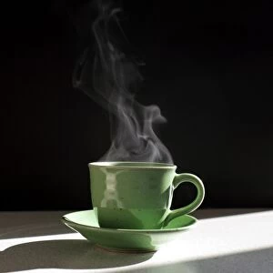Steam rising from hot drink
