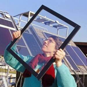 Woman holding an Interpane thermotrope window
