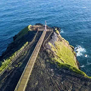 Aerial view of Farolim dos Fenais da Ajuda lighthouse on a cliff, Sao Miguel island, Azores Islands, Portugal, Atlantic, Europe