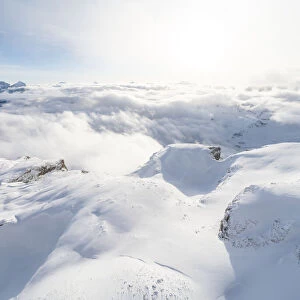 Aerial view of Sass Pordoi covered with snow, Sella group, Dolomites, Trentino-Alto Adige