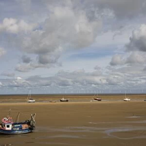 Boats on the beach near New Brighton, Wirral Peninsula, Merseyside, England, United Kingdom, Europe